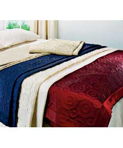 Set contains bedspread and 2 padded pillow shams.55 nylon, 45 polyester face with 50 cotton, 50 poly