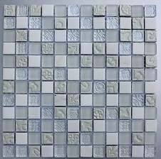 Create a modern quirky feature in your kitchen or bathroom with this white patterned mosaic A combination of frosted glass metallic effect natural stone and plain glass create a real design statement the perfect addition to any interior dcor Pressed 