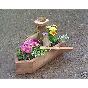 Unbranded Man in Boat Planter