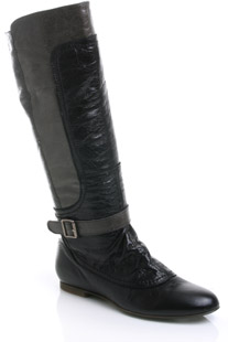 Round toe leather knee high boot featuring grey panel and ankle strap with buckle detail. Stylish, p