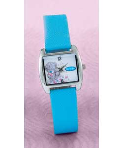 Square white dial with image of grey bear. Numbers