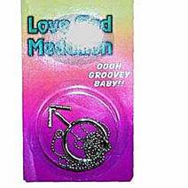 Silver finish medallion with male symbol.