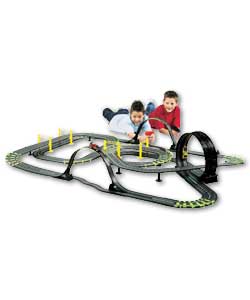 1:43 scale elctric racing set.Over 13 metres of track.Racing features include 2 peaks to master,