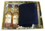 2 mini Bells Whisky bottles in a gift box. Also includes a pair of socks and a cigar for that