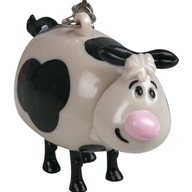Push the funny little cow`s back to get what comes naturally - a tangy tasty candy treat