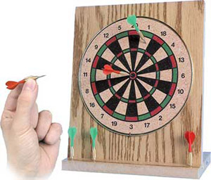 The brass-rimmed cork board is mounted on a hardwood panel with a stand which incorporates dart stor