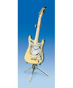 Mini brass finish guitar clock on stand. Dimension
