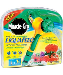 Hose end feeder and liquid fertiliser refill bottle.Feed plants and flowers all around the garden.