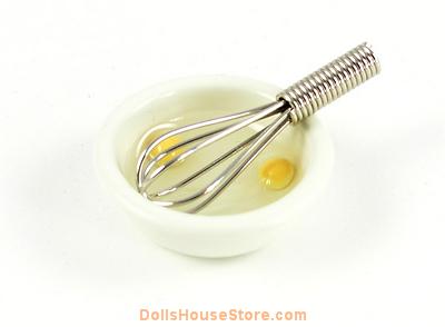 Mixing Bowl Two Broken Eggs & Whisk