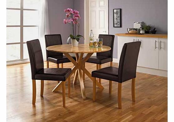 This solid wood and veneer dining table looks great in either a contemporary or classic styled room. Comes with 4 mid back chairs with comfortable leather effect seat pads. Part of the Montego collection. Table: Size H75cm. Diameter 100cm. Solid wood