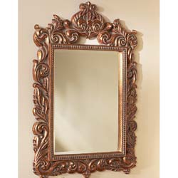 Crafted in polyresin, our luxuriously gilded mirror frame is the epitome of Louis Seize