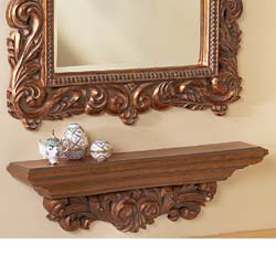 Crafted in polyresin, our luxuriously gilded wall shelf is the epitome of Louis Seize