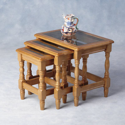 These generously sized tables complimented with sophisticated glass tops. H19    W22   D15.75