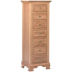 A sweeping 7 drawer chest with 4 main drawers and