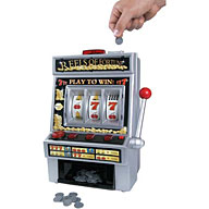 Slot in one of the plastic `coins`  pull the arm and watch the drums roll. The main difference betwe