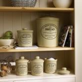 Store your kitchen staples in traditional country style with this charming collection. Crafted from 