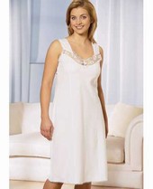 Built-up shoulders. Pretty lace trim neckline machine washable. 65 Polyester 35 Cotton