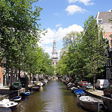 A great introduction to Amsterdam, travel on the brightly covered tourist bus to discover her many h