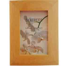 A very simple elegant natural wood photo frames holds 5 x 7 photograph