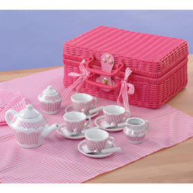 This pretty toy picnic hamper holds a proper china tea set for four little guests 