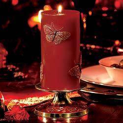 Our red and gold candles will add an ambient glow on those dark Christmas days. Our brass candle