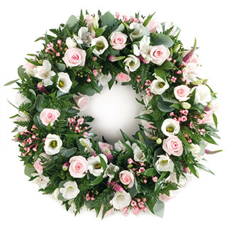 A pretty delicate and feminine wreath with subtle pink and white tones.