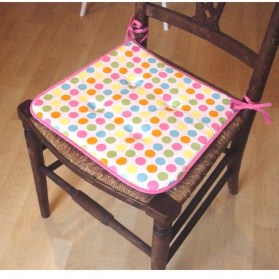 Padded Kitchen Seat Cushion with multi coloured spots & pink Edging    These are pretty yellow blue