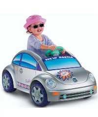 A VW Beetle styled Ride-On. With a bright Barbie d