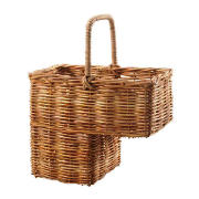 This rattan stair basket creates space-saving storage for the home and is made from natural rattan. 