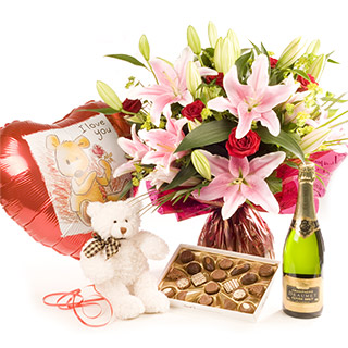 SR03 Standard Rhapsody handtied of Pink lilies and Red Roses is delivered with a SD03 160g box of ch