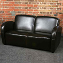 The Rotana dark brown leather sofa suite features a combination of curved and straight lines to