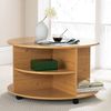 Circular coffee table in a choice of mahogany or antique pine effect finishes. Useful shelf storage 