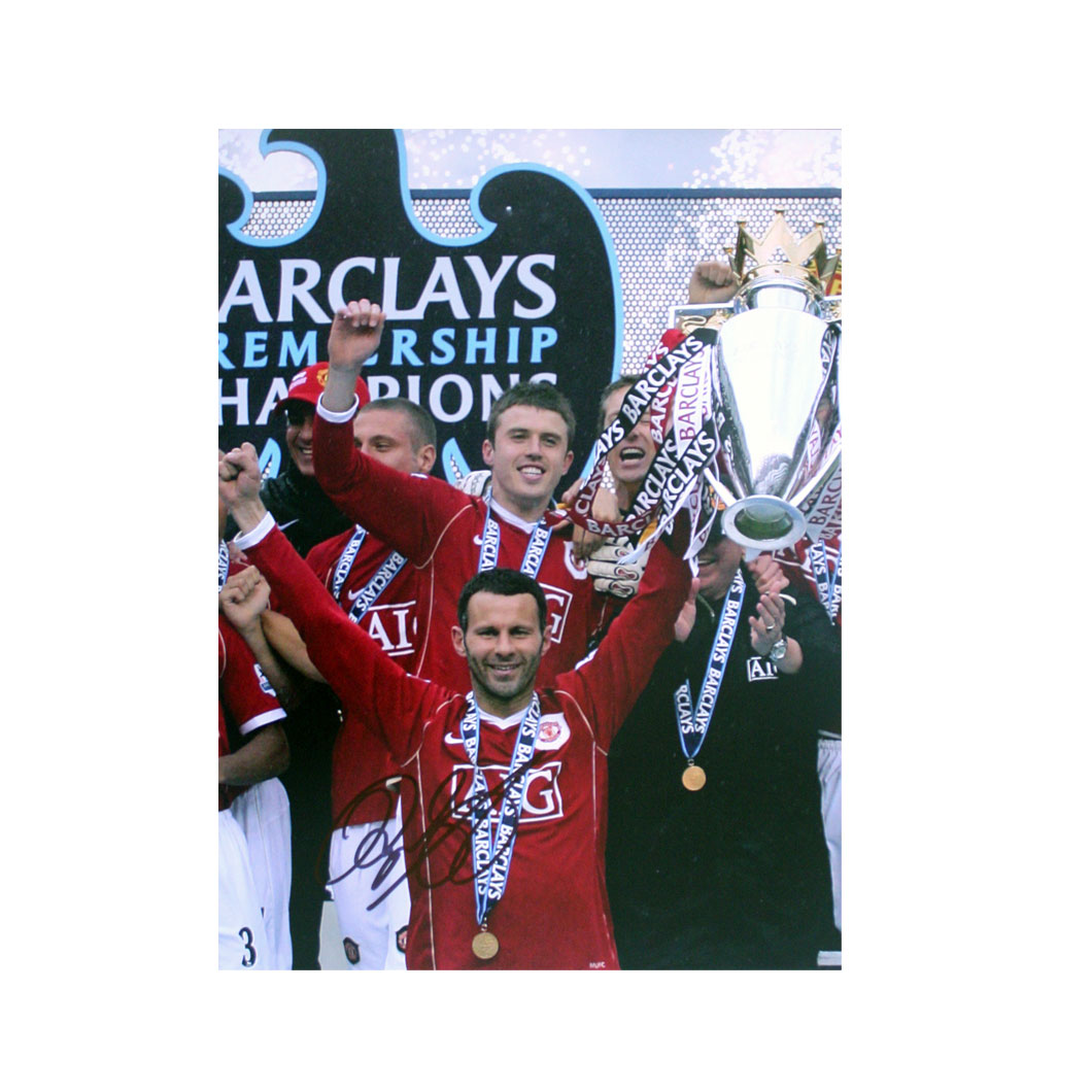 This signed Ryan Giggs photograph shows Giggs lifting the Premiership for Manchester United at the e