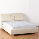 The Seconique Mercedes cream double leather look bed features a unique retractable arm rest in the