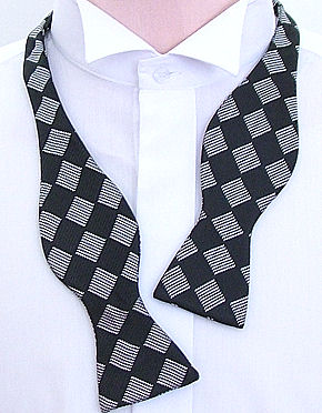 A black with white woven polka dots design silk self-tie 2 3/4` bow tie. 15.99 http://www.tiewarehou