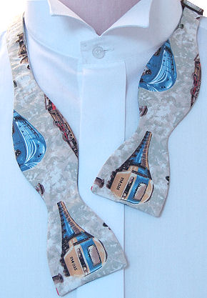 Fans of trains past and present will love this self-tie locomotive bow tie featuring trains in blue,