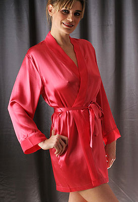 Feel utterly pampered and spoilt in this knee-length robe in rose-coloured silk from Silk Cocoon. Ed