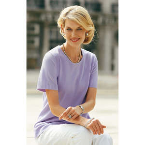 v neck sweater, colourful style with cable designs. wide ribbed edging at the v neckline, extending 