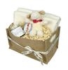 This lovely baby gift includes:Medium Jute Gift Basket with cut out handles Ivory Fleece Blanket 75X