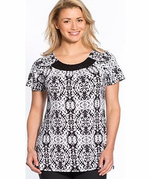This Softly Draping Printed Tunic T-Shirt will show off your cleavage and the fashionable loose fit will flatter any figure. Thats 2 good reasons why you should treat yourself! It features an embroidered beaded inset below the round scoop neckline, s