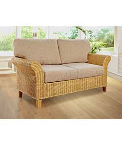 Solaria has an attractive woven rattan frame featuring wing style arms and an upholstered back. Cush