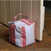 Let the summer breeze in and stop doors banging with this chunky and colourful cotton doorstop. Comp