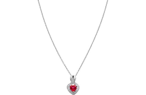 This exquisite necklace is made from solid sterling silver and features a ruby set pendant
