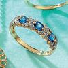 9ct gold eternity ring set with sapphires entwined with diamonds.