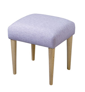 A luxurious fabric stool from the Stuart Jones col
