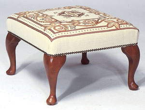 A luxurious fabric stool from the Stuart Jones col