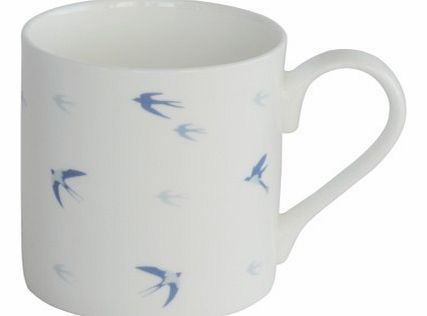Swallows Design Fine Bone China MugDesigned in the UK by Sophie Allport, this beautiful white fine bone china mug is detailed with Swallows in different tones of blue, swooping and gliding around the mug.Buy for yourself to brighten up your tea and c