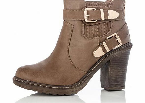 Style yourself with attitude with these ankle boots. With a chelsea design and 2 buckle strap feature, these boots are perfect footwear for a grunge casual look. Complete you biker chick look by pairing with a biker jacket and shiny effect trousers. 