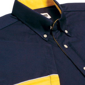 This Teamwear Touring shirt has silver piping separating the 2 diverse colours of navy blue and yell