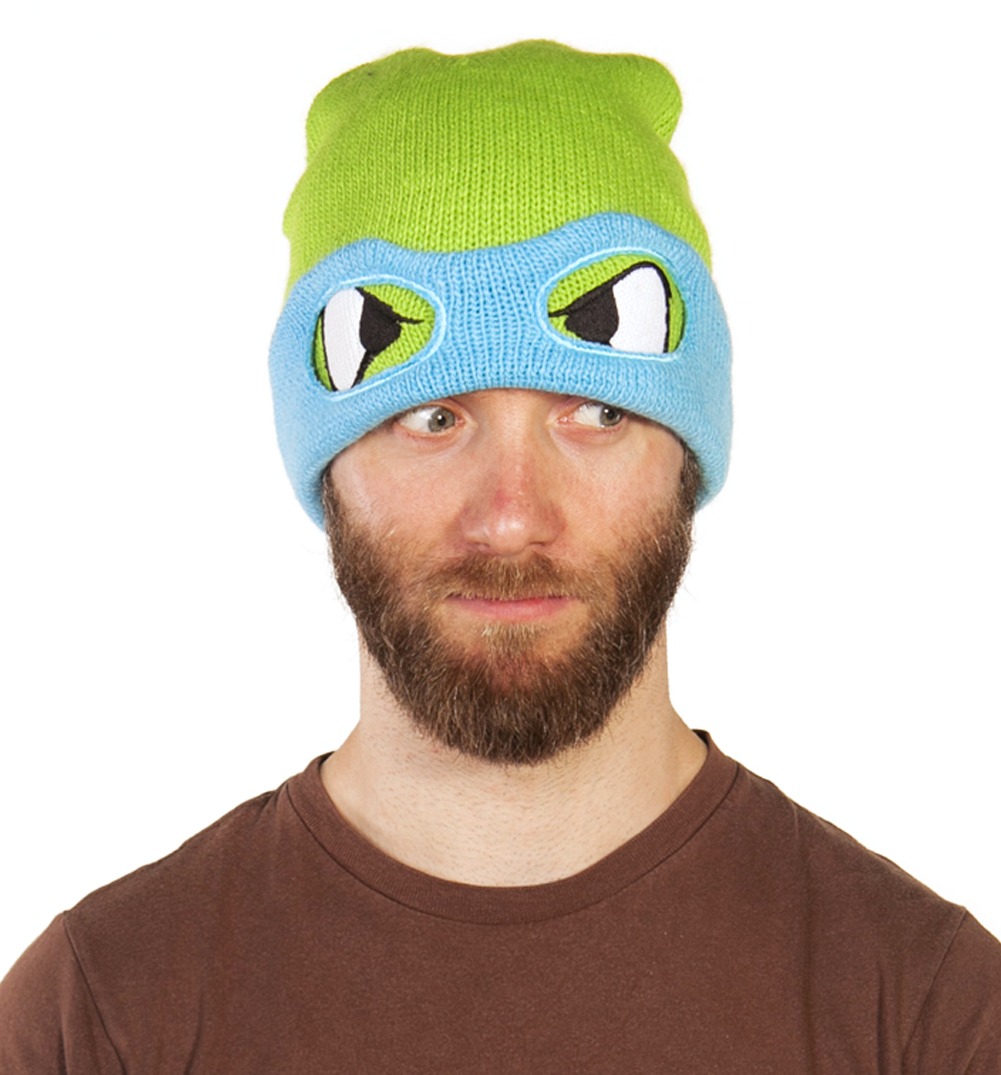 Become a Hero In A Half Shell and your favourite Teenage Mutant Ninja Turtle with an awesome masked beanie hat! This knitted hat features Leonardo who is the courageous leader and a devoted student of martial arts, he wears a blue mask and wields two